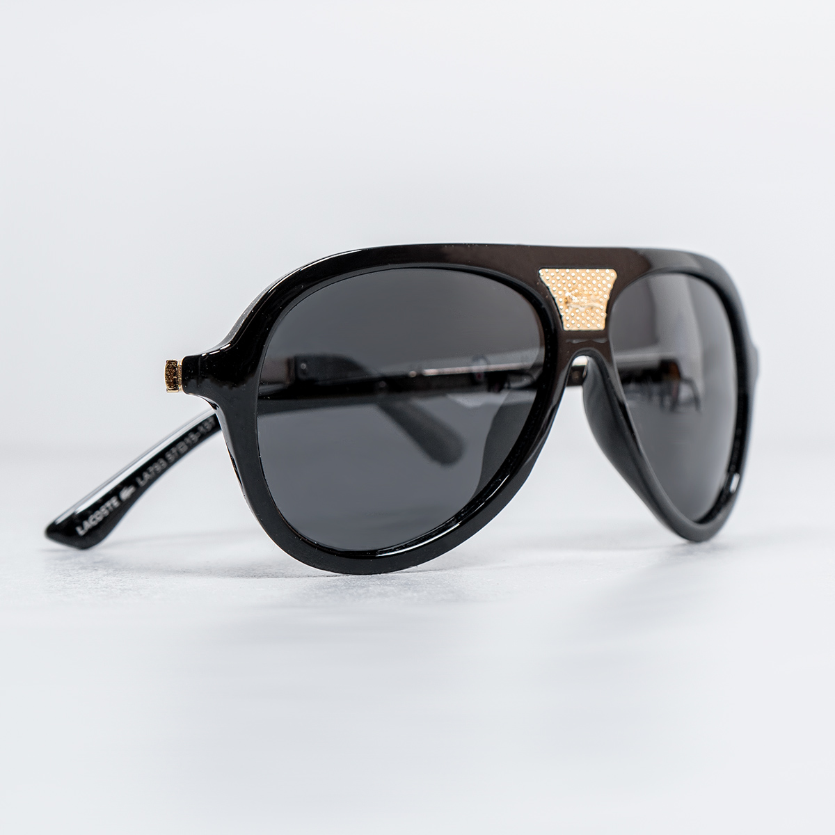 عينك آفتابي LACOSTE مشكي براق