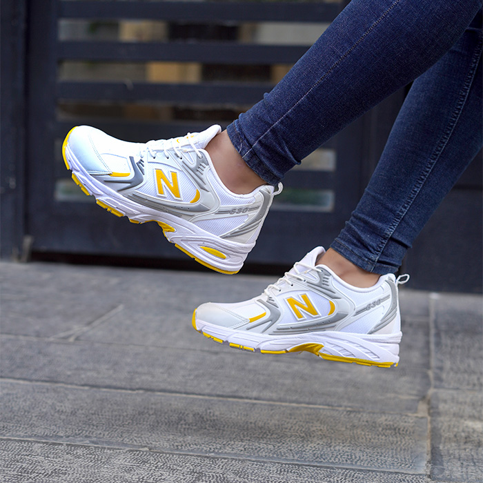 کفش ورزشی مردانه نیوبالانس سفید زردمدل TAKO