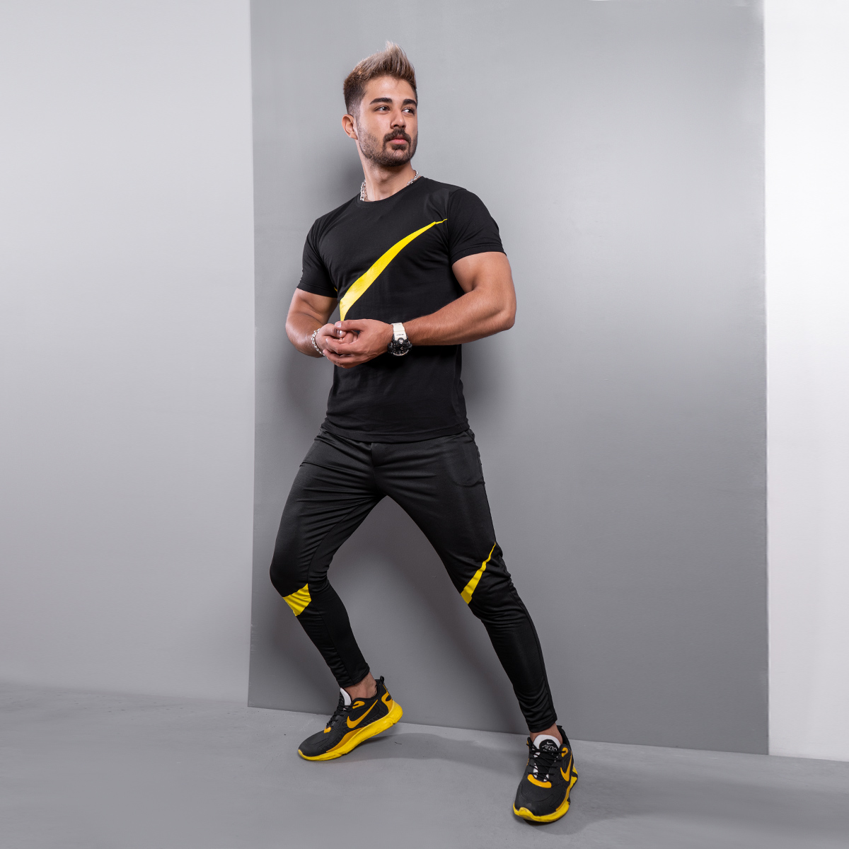 ست تیشرت شلوار نایک مشکی زرد مردانه مدل Baren